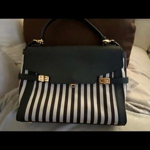 Authentic signature Strpe. Henri Bendel satchel